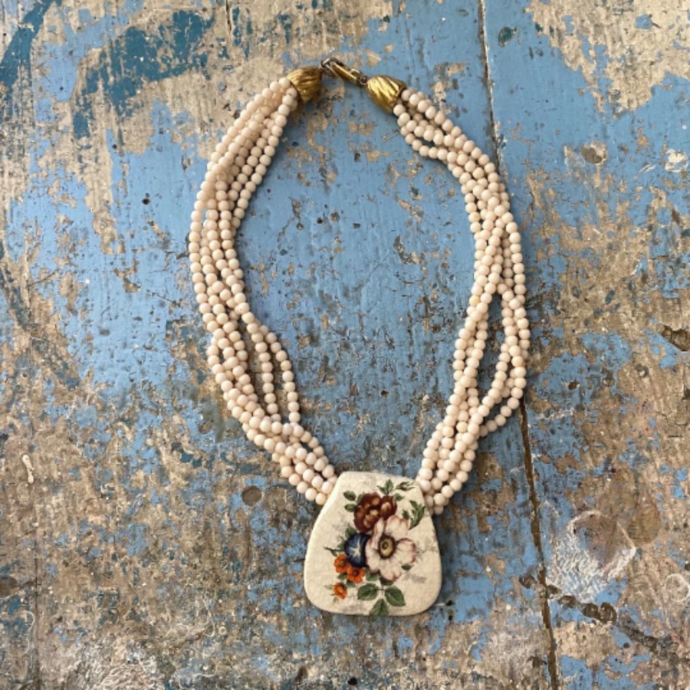Signed Les Bernard necklace six strand bead and hand painted flower disc